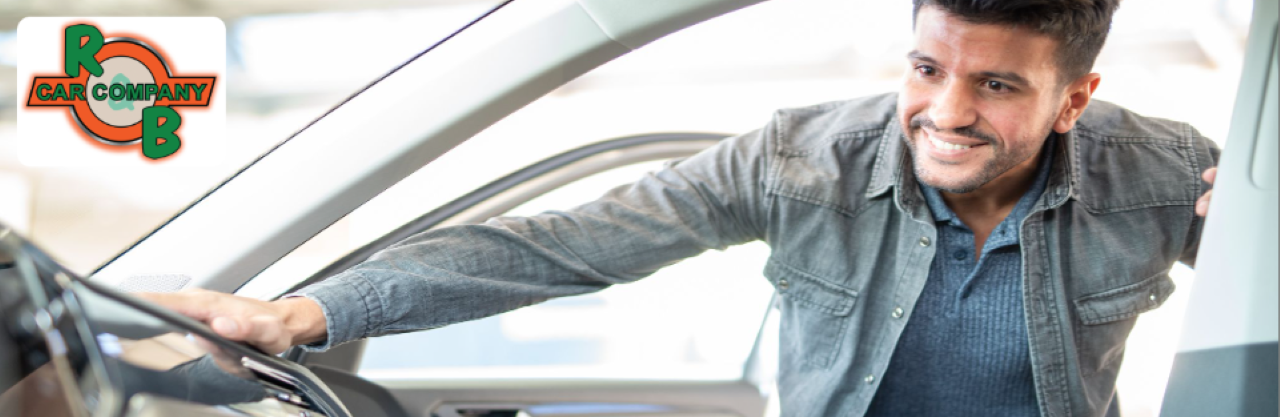 Customer browsing quality used SUVs and trucks at R&B Car Company Fort Wayne in Fort Wayne, IN