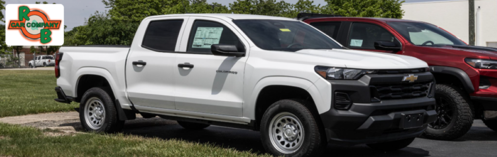 Chevy Silverado and Equinox models displayed at R&B Car Company Warsaw dealership lot.