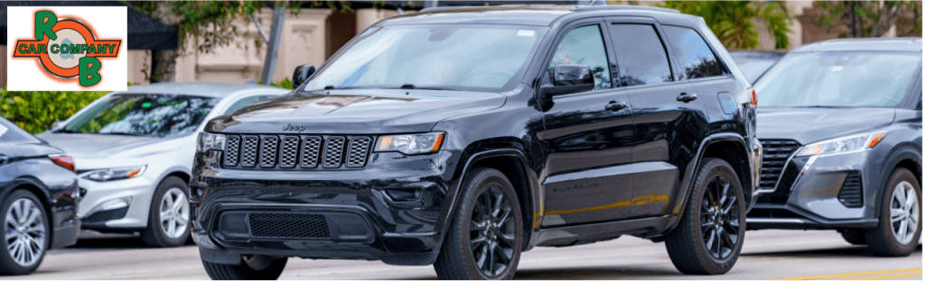 Customers exploring used cars at R&B Car Company South Bend dealership lot